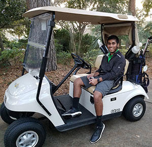 Achintya Krishnan, Cancer Survivor, With Golf Cart