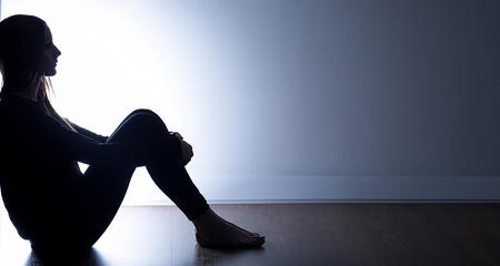 depressed woman - suicide myths and the truth about suicide prevention