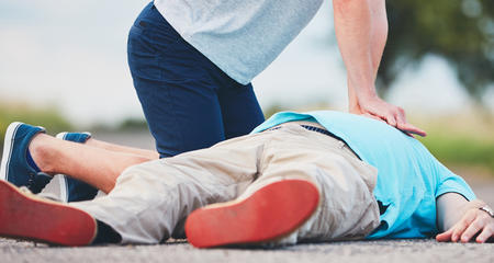 Person performing CPR before first responders arrive. 